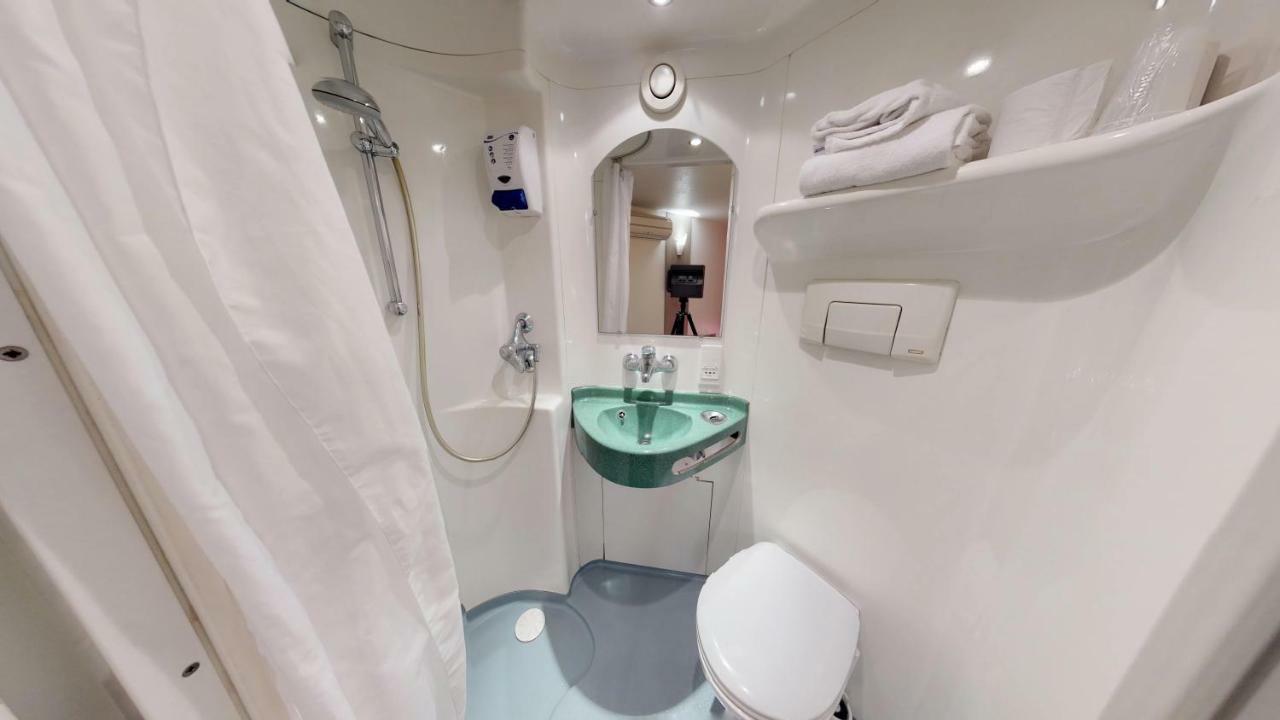 Kyriad Direct Acheres Exterior foto